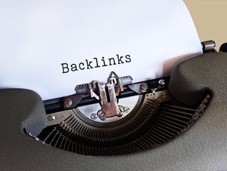 Close-up of a vintage typewriter printing the word 'Backlinks,' emphasizing content and SEO concepts.